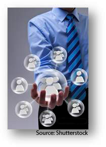 A man “holding” a social network in his hand. Source: Shutterstock