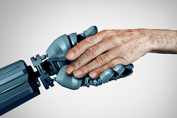 A robot arm holds an elder’s hand.